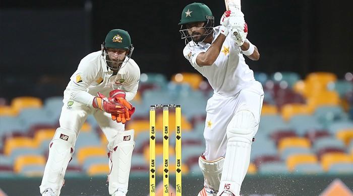Pakistan knuckle down in fight to save pink-ball Test