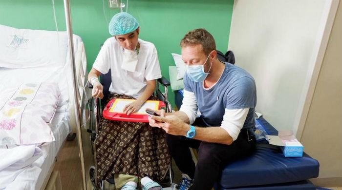 Chris Martin meets fan fighting cancer hours before concert