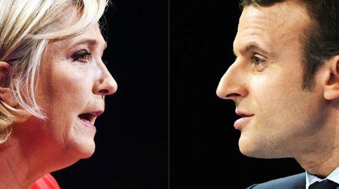 Macron, Le Pen face off in watershed French election