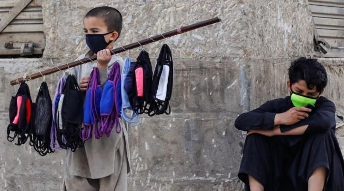 Already beset with financial woes, Peshawar's labourers say they can't afford face masks
