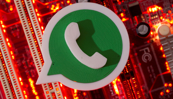 A 3D printed Whatsapp logo is placed on a computer motherboard in this illustration taken January 21, 2021. &mdash; Reuters/File
