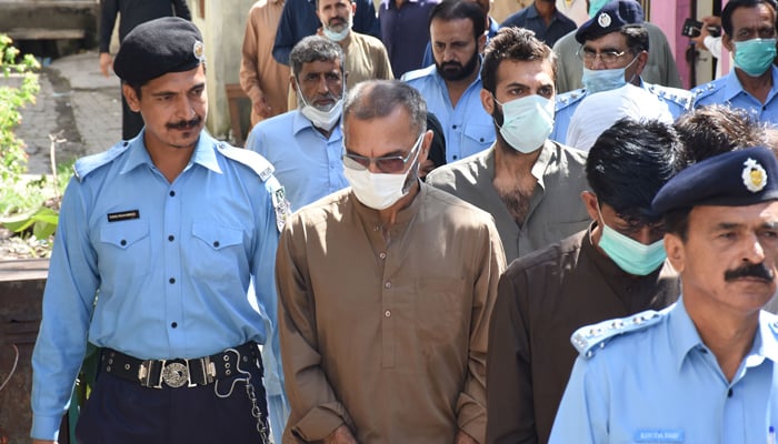 Zahir Jaffer (wearing a grey shirt), his father Zakir Jaffer (centre) arrive to attend an IHC hearing in Islamabad on September 23, 2021. &mdash; Online/File