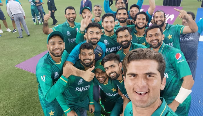 The Pakistani squad can be seen taking a selfie after beating India by 10 wickets on Sunday. — Twitter/TheRealPCB