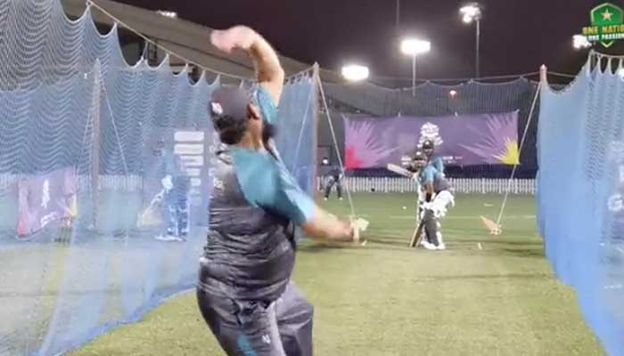 Pakistans interim head coach Saqlain Mushtaq bowls to BabarAzam in the nets. Photo: PCB Twtter