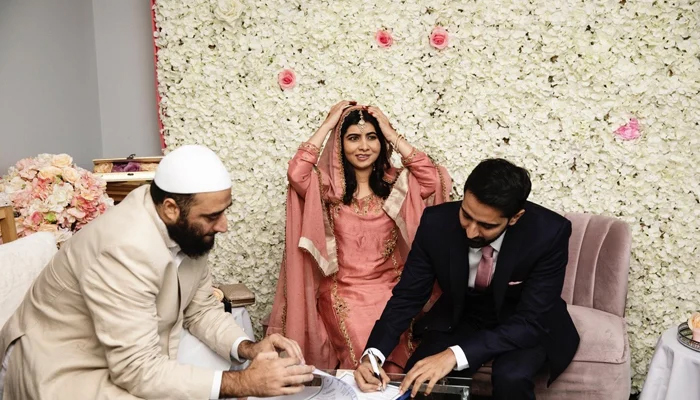 Nobel laureate Malala Yousafzai and her husband during the nikkah ceremony in Birmingham. — Twitter