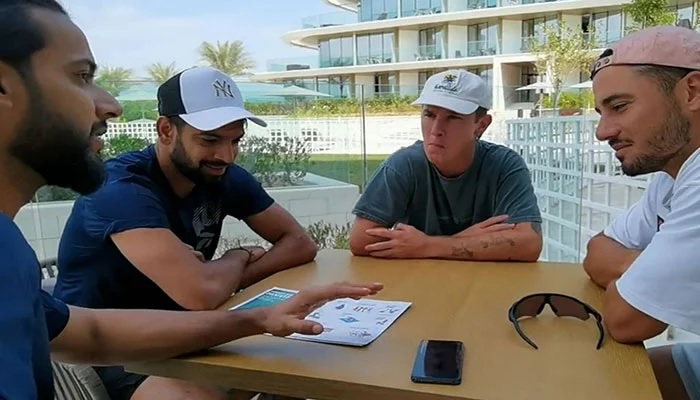 Cricketers Imad Wasim (from left to right), Haris Rauf, Adam Zampa and Marcus Stoinis have a chat ahead of the Pakistan vs Australia T20 World Cup semi-final clash. Photo: Screengrab/ PCB Twitter