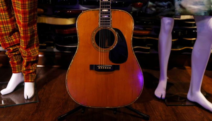 Claptons 1968 Martin D-45 acoustic instrument is the toast of this years Icons & Idols: Rock N Roll