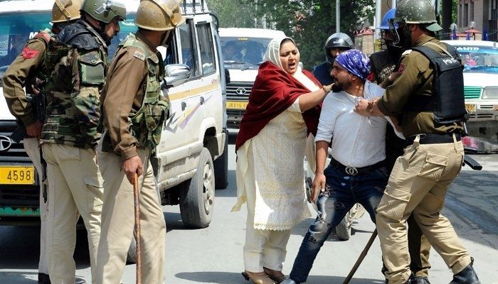 Indian security personnel detain a Kashmiri during protests in Srinagar. Photo: AFP/File