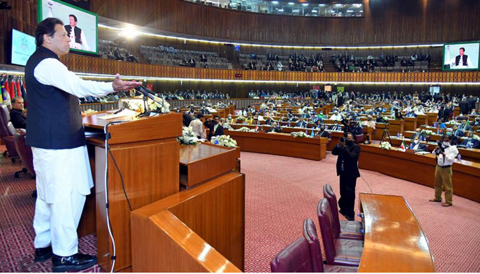 Prime Minister Imran Khan addressing the 48th Ogranization of Islamic Cooperation conference at Parliament House, Islamabad on March 22, 2022. &mdash; PID