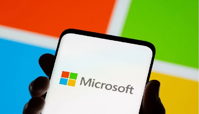Smartphone is seen in front of Microsoft logo displayed in this illustration taken, July 26, 2021. &mdash;Reuters