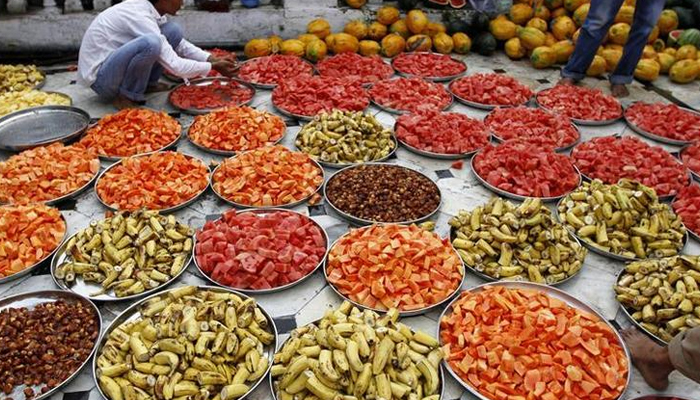 A Muslim man prepares for Iftar, the evening meal for breaking fast, during the holy month of Ramadan inside a mosque. — Reuters/File