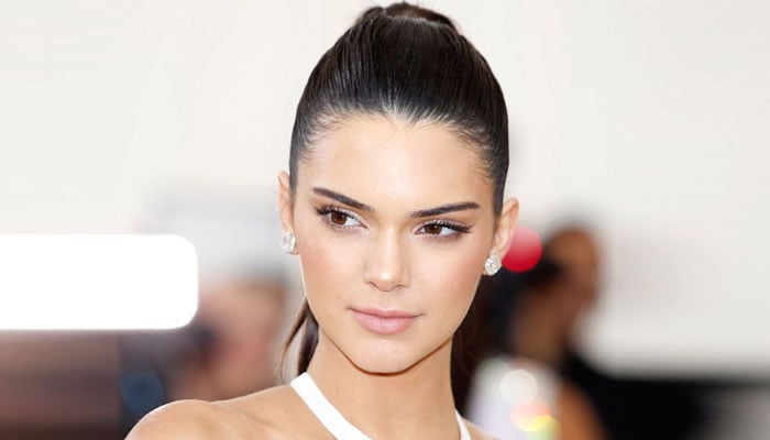 Kendall Jenner stuns onlookers as she showcases her long legs in white shorts