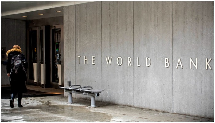 A person enters the building of the Washington-based global development lender, The World Bank Group, in Washington. &mdash; AFP