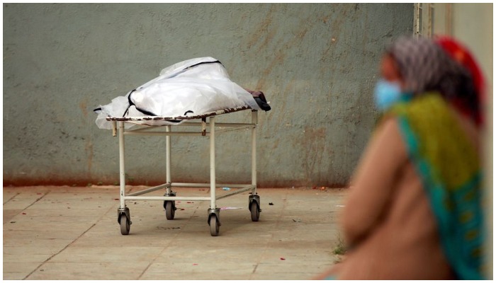 Relatives wait to receive the body of a man after he died from the coronavirus disease (COVID-19), outside a mortuary of a COVID-19 hospital in Ahmedabad, India, February 4, 2022. — Reuters/ file