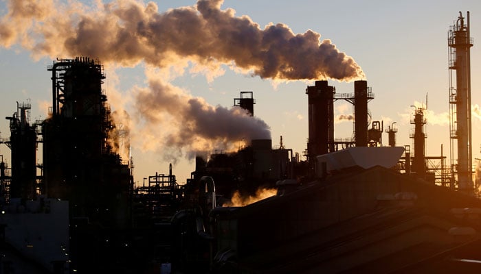 Smoke rises from a factory. — Reuters/File