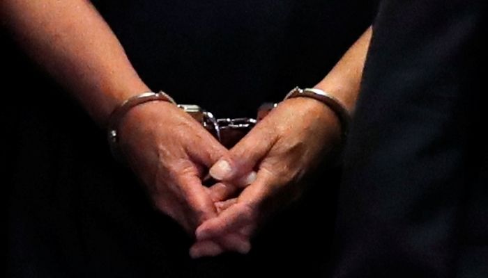 Former Trump campaign chairman Paul Manaforts hands are shown in handcuffs as he is escorted into court during before his arraignment in New York Supreme Court in New York, U.S., June 27, 2019.&mdash;Reuters