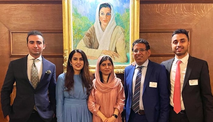 Nobel laureate Malala Yousafzai (L) attends the launching ceremony of the Oxford Pakistan Programme (OPP) at the Lady Margaret Hall (LMH) — situated at the University of Oxford — on May 26, 2022. — OPP