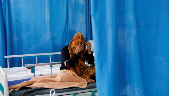 An Afghan woman sitting on a hospital bed in Kabul. &mdash; Reuters