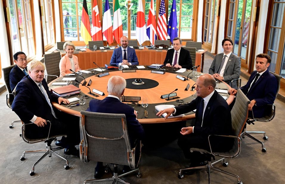 German Chancellor Olaf Scholz, US President Joe Biden, British Prime Minister Boris Johnson, Japans Prime Minister Fumio Kishida, European Commission President Ursula von der Leyen, European Council President Charles Michel, Italys Prime Minister Mario Draghi, Canadas Prime Minister Justin Trudeau and Frances President Emmanuel Macron attend a round table for their first working session of G7 group at Bavarias Schloss Elmau Castle, near Garmisch-Partenkirchen, Germany June 26, 2022. &mdash; Reuters