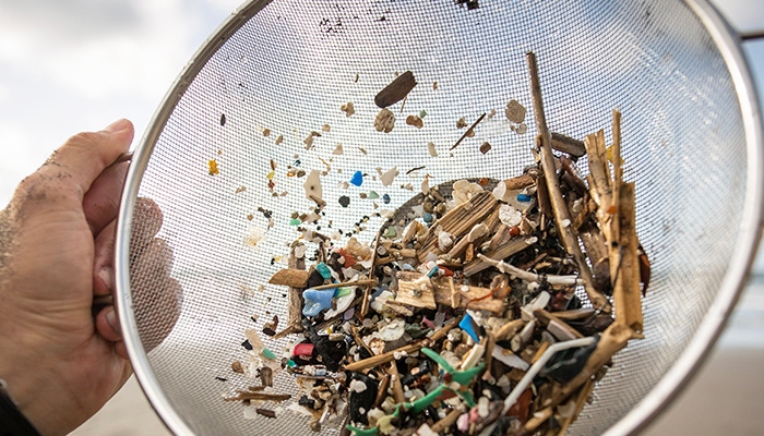 Image showing pieces of plastic in a collander. &mdash;&nbsp;Desiree Martin / AFP / Getty Images
