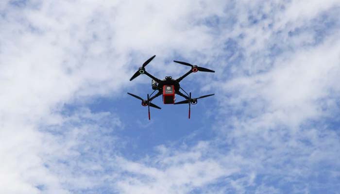 A medicines delivery drone flies outside a drugstore in Trikala, Greece September 21, 2021.&mdash; Reuters