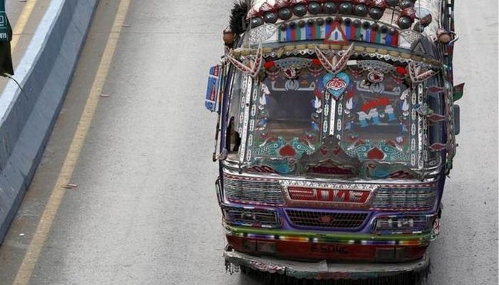 A public bus on Karachi Shahrah e Faisal&nbsp; &mdash; Reuters