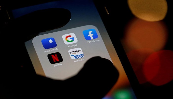 The logos of mobile apps, Google, Amazon, Facebook, Apple and Netflix, are displayed on a screen in this illustration picture taken December 3, 2019. &mdash;REUTERS/Regis Duvignau