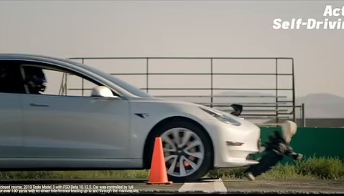 Tesla runs over child mannequin.&mdash; Screengrab via YouTube