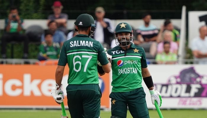 Mohammad Rizwan (R) and Agha Salman fistbump after Pakistan defeated the Netheralands in the second one-day international (ODI) in Rotterdam on August 16, 2022. &mdash; Twitter/TheRealPCB