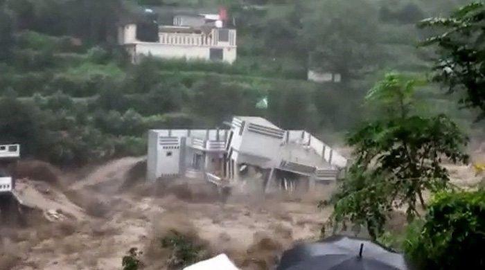 WATCH: Raging floodwaters sweep away house in Swat