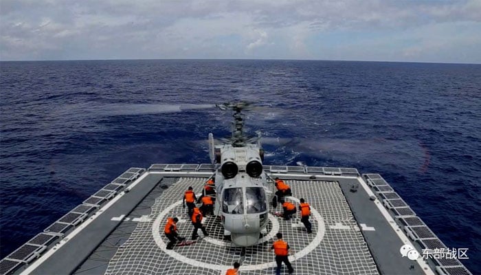 A Navy Force helicopter under the Eastern Theatre Command of Chinas Peoples Liberation Army (PLA) takes part in military exercises in the waters around Taiwan, at an undisclosed location August 8, 2022 in this handout picture released on August 9, 2022. &mdash; Reuters