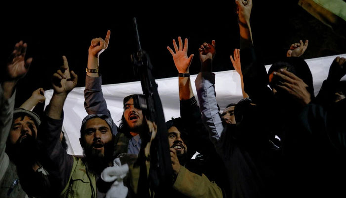 Taliban supporters celebrate the first anniversary of the departure of US forces from Afghanistan on a street in Kabul on August 30, 2022. — Reuters