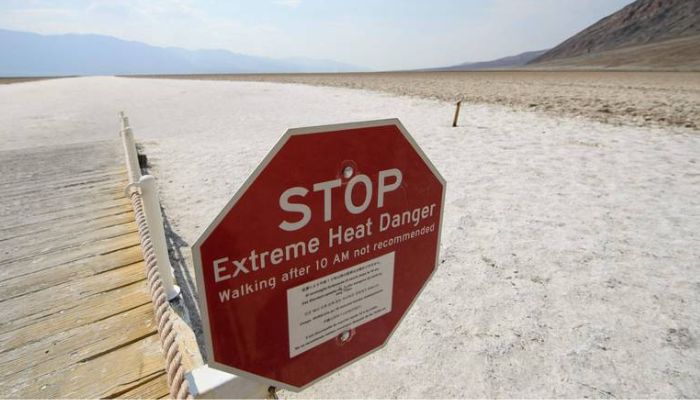 Sign warns of extreme heat at the Badwater Basin salt flats inside Death Valley National Park in California. &mdash;&nbsp; AFP