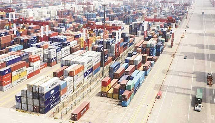 Containers of imported goods are placed near a port in Karachi. Photo: AFP/file