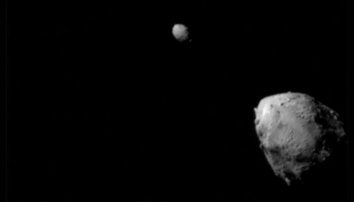 The last image to contain a complete view of asteroid Didymos (top left) and its moonlet, Dimorphos, about 2.5 minutes before the impact of NASA’s DART spacecraft, taken by the on board DRACO imager from a distance of 920 kilometers, and released September 26, 2022. — Reuters via NASA