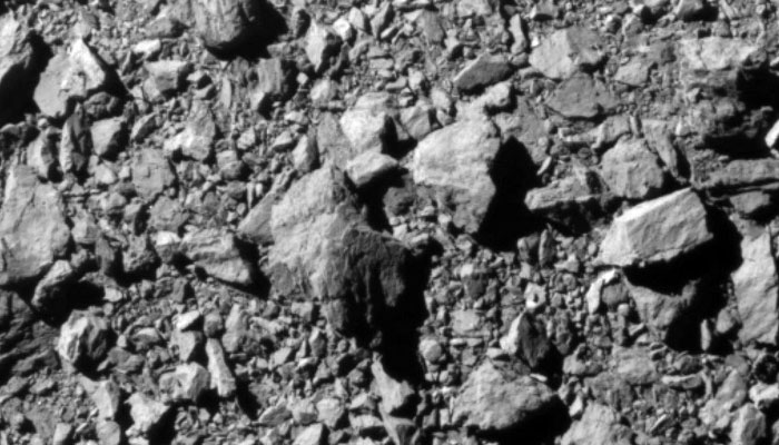 The last complete image of asteroid moonlet Dimorphos, taken by the DRACO imager on NASAs DART mission 12 kilometers from the asteroid and 2 seconds before impact, showing a patch of the asteroid that is 31 meters across, released September 26, 2022. — Reuters via NASA