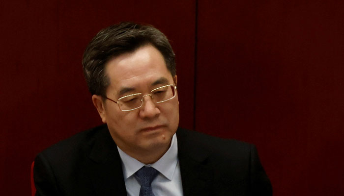 Ding Xuexiang, director of the General Office of the Central Committee, attends the opening session of the Chinese Peoples Political Consultative Conference (CPPCC) at the Great Hall of the People in Beijing, China March 4, 2021. — Reuters/File