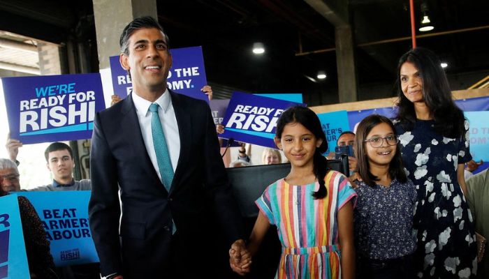 Rishi Sunak, his wife Akshata Murthy and his daughters Anoushka and Krishna attend a Conservative Party leadership campaign event in Grantham, Britain, July 23, 2022.— Reuters