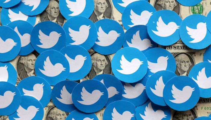 Twitter logos and U.S. dollar banknotes are seen in this illustration, August 10, 2022.— Reuters