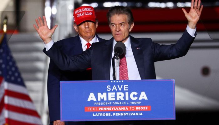Former US President Donald Trump looks on as Pennsylvania Republican U.S. Senate candidate Dr Mehmet Oz speaks at a pre-election rally to support Republican candidates in Latrobe, Pennsylvania, US, November 5, 2022.— Reuters