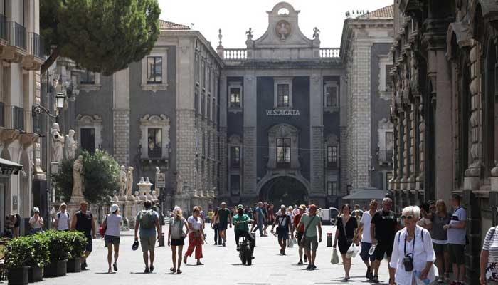 People walk around Piazza del Duomo, in Catania, ahead of Italian general election, in eastern Sicily, Italy, September 8, 2022. — Reuters