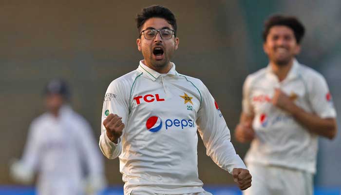 Pakistans Abrar Ahmed celebrates taking the wicket of Englands Zak Crawley on December 17, 2022. — Reuters