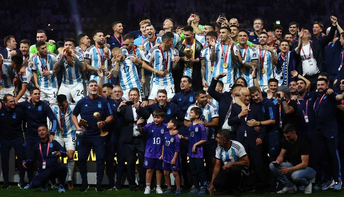 Argentina celebrate with the trophy after winning the World Cup. — Reuters
