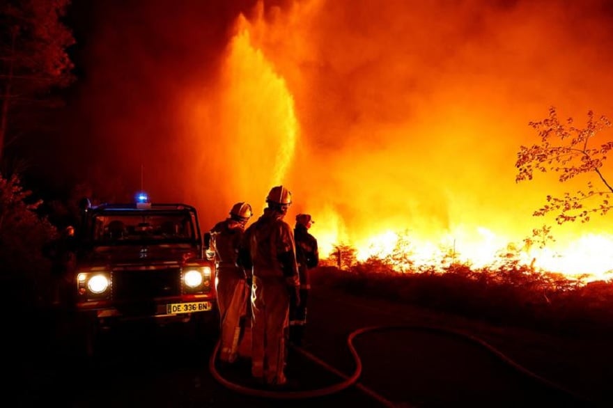 Firefighters work to contain a tactical fire in Louchats, as wildfires continue to spread in the Gironde region of southwestern France, July 17, 2022. — Reuters