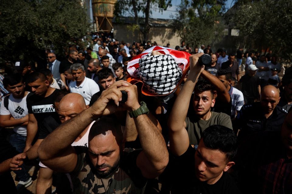 Mourners attend the funeral of Palestinian in West Bank, September 15, 2022.— Reuters