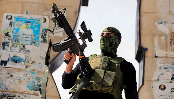 A freedom fighter attends the funeral of a Palestinian Islamic Jihad gunman, who was martyred by Israeli forces, in Jenin in the Israeli-occupied West Bank. — Reuters/File