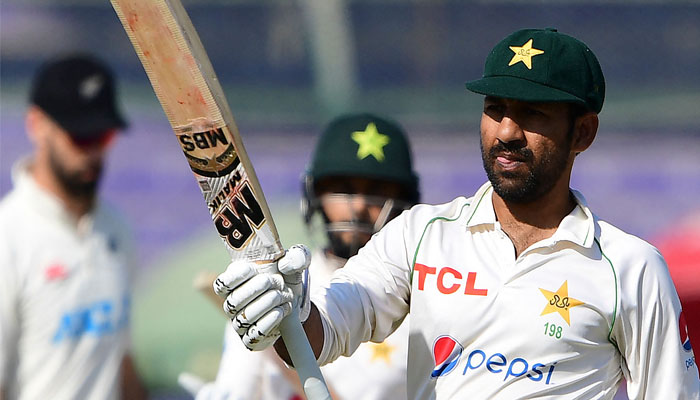 Pakistans Sarfaraz Ahmed reacts after scoring a half-century (50 runs) during the fifth and final day of the second cricket Test match between Pakistan and New Zealand at the National Stadium in Karachi. — AFP