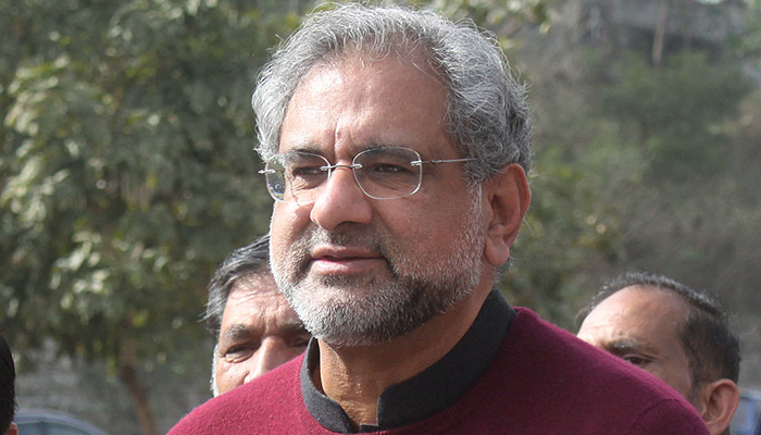 Senior PML-N leader Shahid Khaqan Abbasi talking to media persons outside in Islamabad on March 8, 2022. — Online