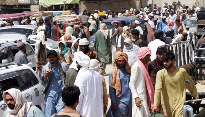 People arriving from Afghanistan gather at the Friendship Gate crossing point in the Pakistan-Afghanistan border town of Chaman, Pakistan. — Reuters/File