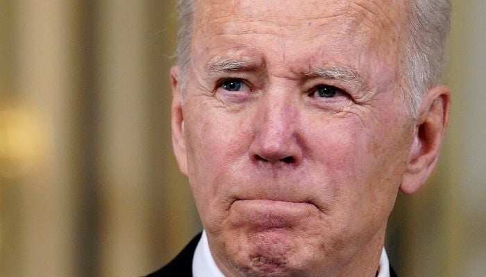 US President Joe Biden responds to a question about Ukraine during an event to announce his budget proposal for fiscal year 2023, in the State Dining Room at the White House in Washington, US, March 28, 2022.— Reuters